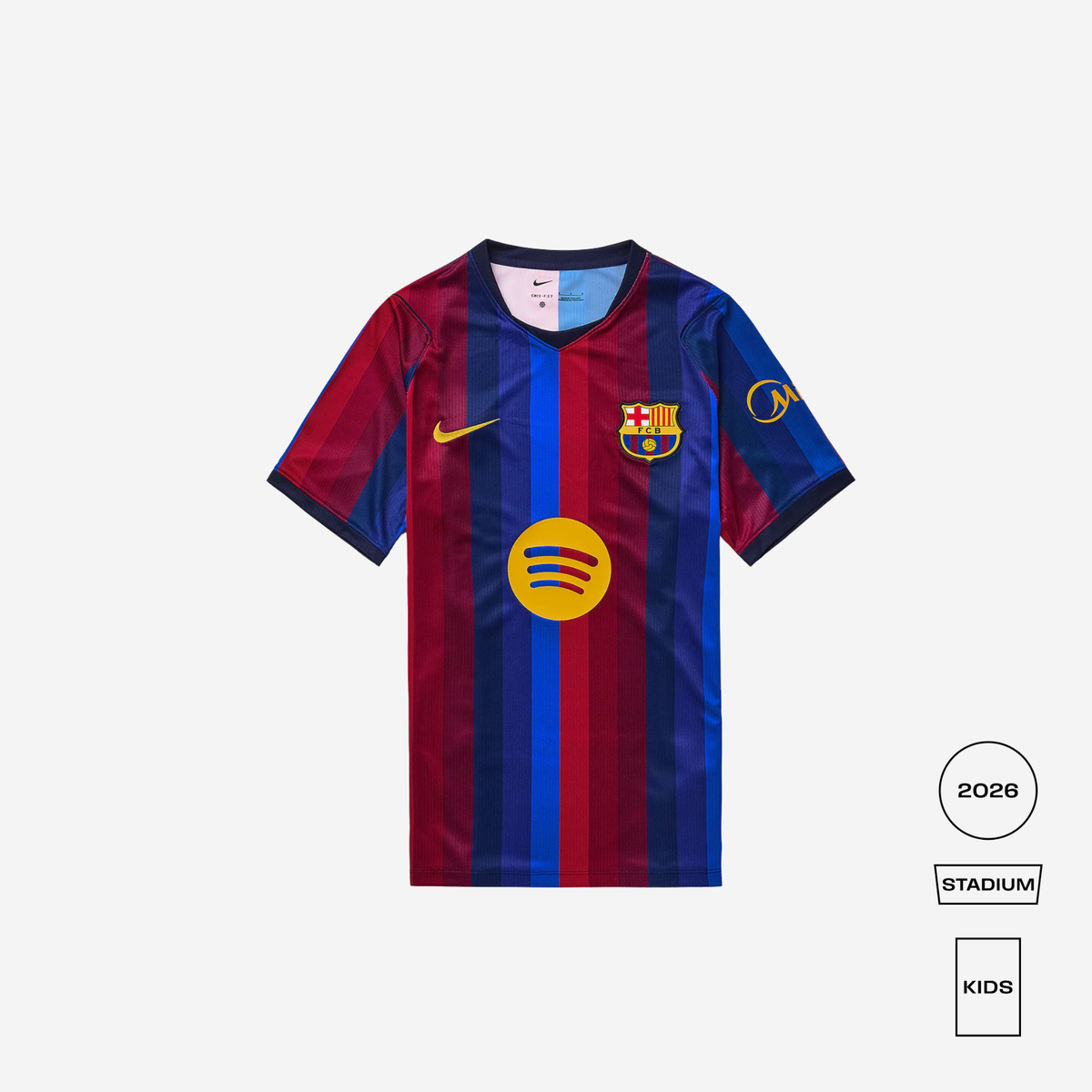 A Nike FC Barcelona home soccer jersey for kids, featuring the club's iconic blue and red vertical stripes, a yellow Nike swoosh, and a large yellow Spotify sponsor logo on the front. The jersey is displayed flat against a light gray background with product variant badges on the bottom right.