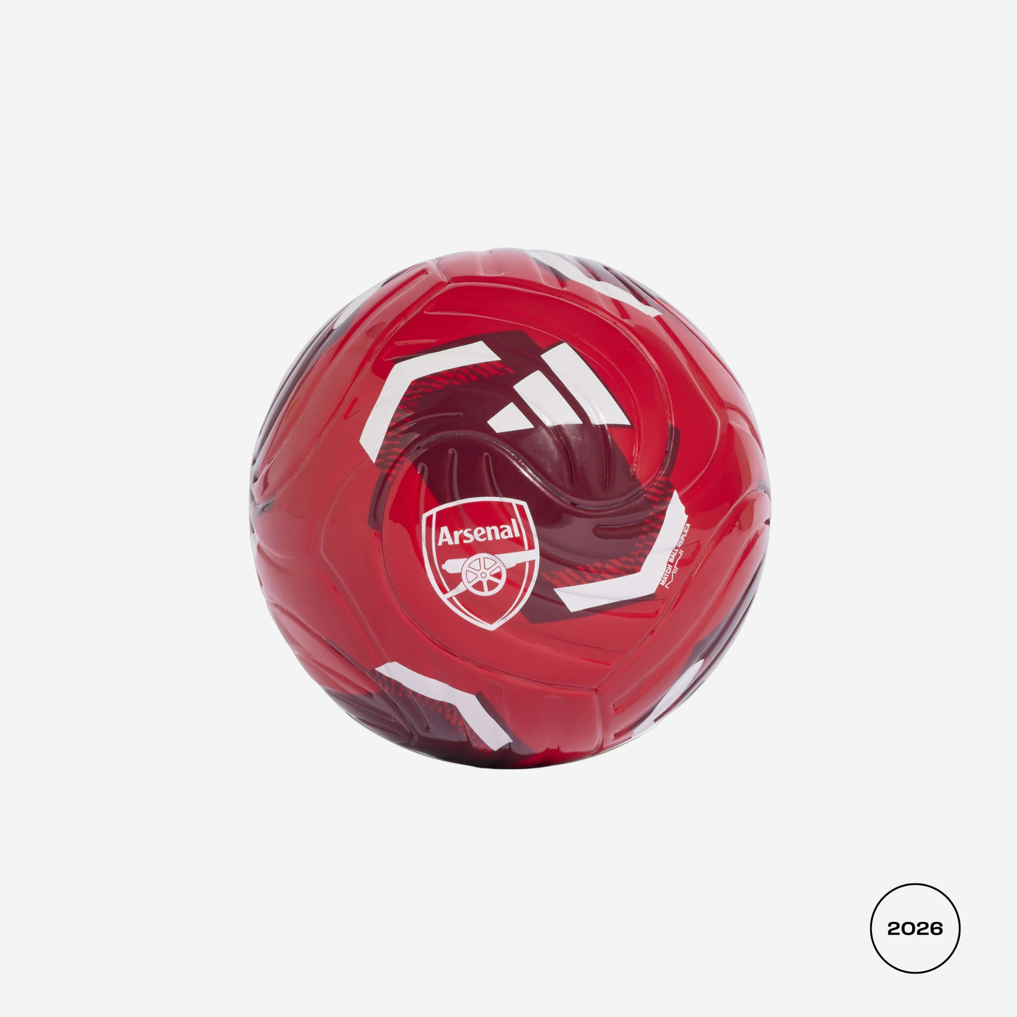 A red Adidas Arsenal soccer ball with white logo details, shown on a light gray background with a small '2028' circle in the bottom right corner.