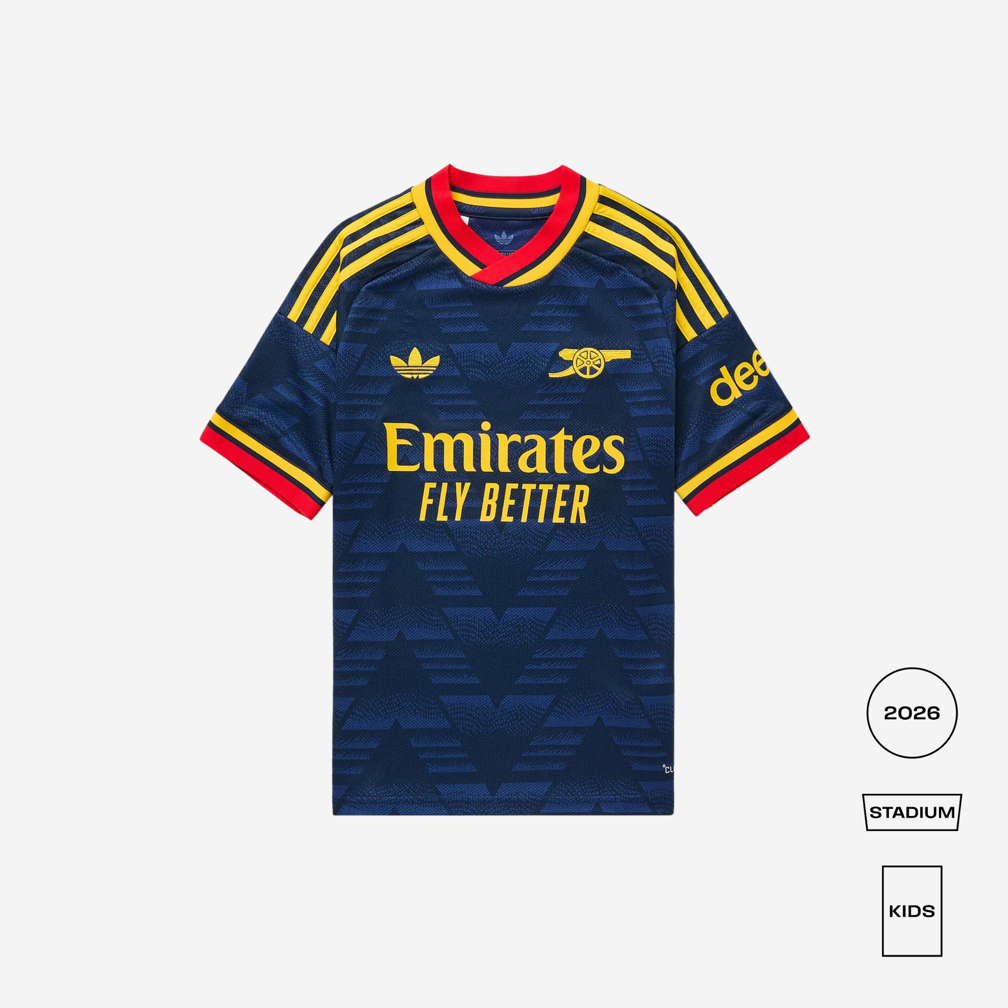 A kids' Arsenal football jersey in navy blue with yellow and red accents, featuring the Adidas logo, Arsenal crest, Emirates Fly Better sponsor, and 'de'ad' on the sleeve, shown on a light gray background with size badges on the bottom right.